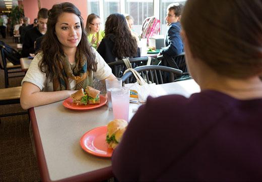 Student in dining hall.